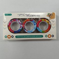 the packaging is designed to look like tie - dye and has three different designs on it