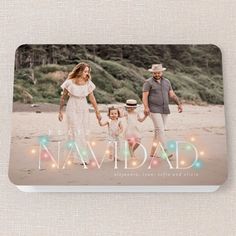 a family photo with the word dad and two children in front of them on a beach