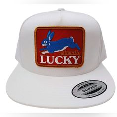 Step Out In Style With Our Handcrafted 'Retro Vintage Style Naturally Lucky Rabbit Trucker Hat Cap.' Made With Care And Pride In The United States, This Classic Fashion Icon Is A Must-Have For Anyone Who Wants To Stand Out From The Crowd. Featuring A Lucky Rabbit Embroidered On The Front, This Hat Is Perfect For Those Who Are "Naturally Lucky." The Iconic Usa Embroidery On The Side Adds To Its Timeless Appeal, Making It An Ideal Accessory For Any Casual Outfit. Crafted From Premium Materials And Vintage White Trucker Hat For Spring, Vintage White Baseball Cap With Curved Brim, Retro Baseball Cap With Curved Brim, Vintage Trucker Cap For Spring, Vintage Trucker Hat For Spring, Vintage Snapback Hat For Spring, Vintage Spring Trucker Cap, Spring Vintage Trucker Hat, Vintage Snapback Cap For Spring