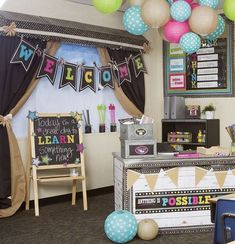 an office decorated with balloons, signs and other items for children's birthdays