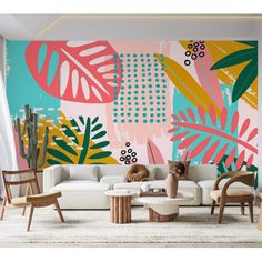 a living room filled with lots of furniture and walls painted in colorful tropical leaves on the wall