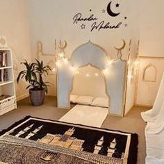 a bed room with a neatly made bed next to a book shelf