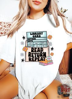 a woman is sitting on the bed wearing a shirt that says library grab read return repeat