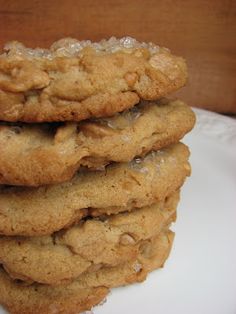 a stack of cookies sitting on top of a white plate