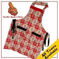 an apron with red and white designs on it