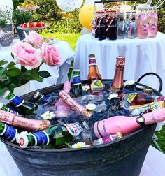 an ice bucket filled with lots of bottles