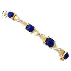 A stunning antique Austrian 7.20 carat basaltic sapphire and 0.45 carat diamond, 14 karat yellow gold bracelet; part of our diverse antique jewelry collections. This stunning, fine and impressive basaltic cabochon cut sapphire bracelet has been crafted in 14k yellow gold. The bracelet consists of nine square shaped links, each ornamented with a feature four claw set cabochon cut basaltic sapphire, varied in size. The nine links articulate via twist design connector bars, each accented with four Victorian People, Nine Square, Bracelet Diamond, Yellow Gold Bangle, Gold Link Bracelet, Antique Bracelets, Gold Armband, Sapphire Bracelet, Yellow Gold Bracelet