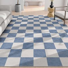 a blue and white checkered rug in a living room