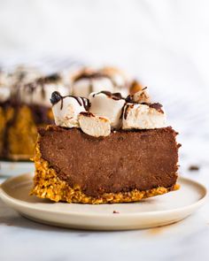 a slice of chocolate pie with marshmallows on top