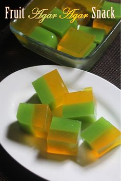 some pieces of fruit on a white plate