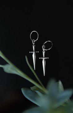 A symbol of protection these knife earrings will add a little fierce-ness to your day. Pair these beauties perfectly with our Marceline Necklace in 14k Gold, Brass, or Silver. FEATURED IN BRITISH VOGUE "Cival is a collective of women who design, and hand make jewelry that inspires creativity and confidence. As a symbol of protection, our 'Marceline' earrings are a nod to our fierce side, embodying bravery, and strength." - British Vogue September 2021 Issue Materials & Details Knife charm measur Marceline Cosplay, Knife Earrings, Symbol Of Protection, Dagger Earrings, Make Jewelry, Vogue Magazine, Stunning Jewellery, Hand Made Jewelry, Gold Style