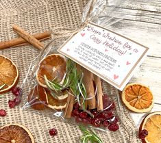 an assortment of dried fruit and cinnamons on a table with a sign that says, i love you