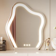 a white dresser topped with a large mirror