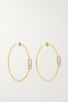 Messika's 'Move Uno' hoop earrings are designed in a slim yet sizable, jaw-grazing shape. They're handmade from 18-karat gold and have a central diamond that glides freely within a pavé-set oblong cutout. We also have the smaller white and rose gold versions in our edit. Designer Yellow Gold Hoop Jewelry, Messika Earrings, Messika Move Uno, Gold Diamond Hoop Earrings, Diamond Ear Cuff, Diamond Earrings Design, Gold Ear Cuff, Earrings Design, Large Hoop Earrings