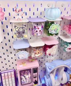 there are many different items on display in the store and one is pink, blue, white and green