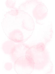 an orange and pink blurry background with circles