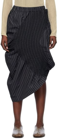 Find ISSEY MIYAKE Black Contraction Midi Skirt on Editorialist. Garment-dyed polyester-blend poplin skirt. Stripes, shirring, and gathering throughout. · Asymmetrical construction · Elasticized waistband · Single-pocket styling Supplier color: Black Assymetric Denim Skirt, Futuristic Skirt, Low Waisted Skirt, Knitted Skirts, November Fashion, Poplin Skirt, Designer Skirts, Jacquard Skirt, 17 Black