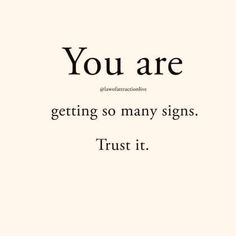 the words you are getting so many signs, trust it on a white background with black lettering