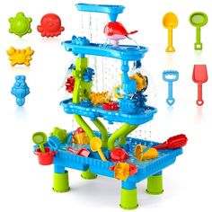 an assortment of toys and tools for children to play with on the go water playset