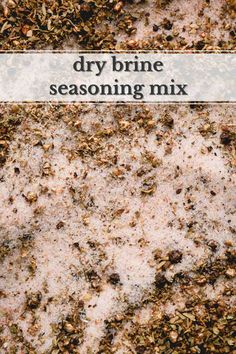 the words dry brine seasoning mix are overlaid with brown and white flecks