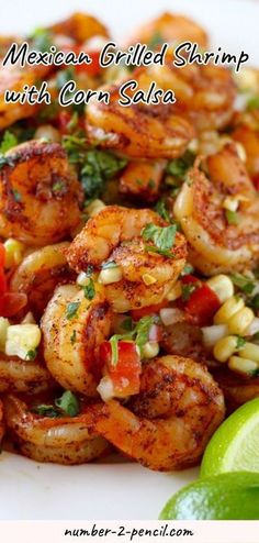 mexican grilled shrimp with corn salsa on a white plate