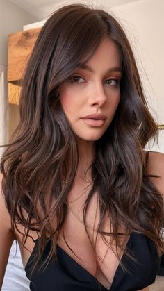 Discover the top Chocolate Brown hair color trends for 2025 with these 20 stunning ideas. From rich and dark tones to light highlights and caramel balayage, find the perfect shade for your style. Explore options for short, medium, and long lengths, plus ideas suited for morena, Asian skin tones, and black women. Chocolate Brown Balayage Asian Hair, Black To Chocolate Balayage, Chocolate Brown Hair With Dark Roots, Truffle Brown Hair Color, Medium Skin Hair Color, Dark Brown Hair Warm Tones, Glazed Brown Hair, Hair Color Light Brown Caramel, Highlights For Morena Skin