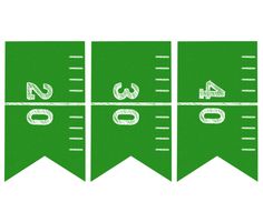 four green flags with numbers and symbols drawn on them, all in the same row