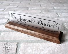 "A unique gift idea to celebrate a graduation, new career, or promotion! A perfect addition to any professional office setting. Please read before ordering These desk name plates are made out of hardwoods that are sturdy and built to last! They are made with frosted acrylic that resists shattering and gives an elegant finish to any office desk or work station. These can be made with any text and can be as simple or fancy as you want! These are each made by hand by our husband and wife duo in our Unique Office Decor, Teacher Name Plates, Office Decor Professional, Desk Name Tags, Office Desk Name Plates, Name Plate Design, Unique Office, Personalized Name Plates, Rustic Desk