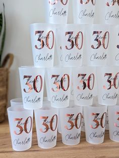 there are many cups that have the numbers on them and one is for someone's 30th birthday