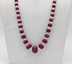 AAA Quality Natural Melon Shape Ruby And Natural Pearl Necklace, Ruby Jewelry, Moti Mala, Ruby Necklace, Necklace With Silver Lock Specifics: Material : Gemstone Stone Size: Variation 1 : RUBY    --> 6.2 mm X 4.0 mm   --  14.8 mm X 12.4 mm                                            PEARL  --> 5.5 mm X 5.5 mm                      Variation 2 : RUBY    --> 6.0 mm X 3.9 mm   --  17.3 mm X 14 mm                                            PEARL  --> 5.5 mm X 5.5 mm Stone :   Natural Ruby And Natural