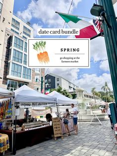 people shopping at an outdoor farmer's market under a sign that says date card bundle spring