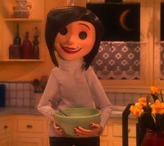 a cartoon character holding a bowl in a kitchen