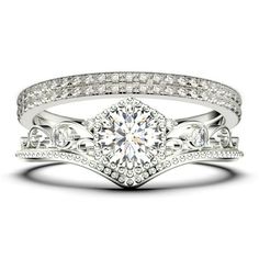 a white gold engagement ring set with diamonds