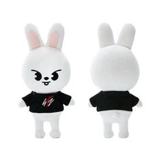 two white stuffed animals wearing black shirts