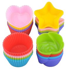 colorful cupcake liners with heart shaped stars on top and star - shaped bowls below