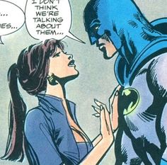 a comic character talking to another person in the dark knight suit and batgirl mask