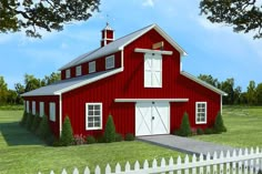 a red barn with a white picket fence