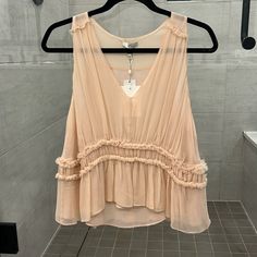 Peach Colored, Never Worn Elegant Peach Top For Summer, Elegant Peach Tops For Summer, Peach Party Tops For Spring, Peach Party Top For Spring, Peach Blouse For Beach In Spring, Peach Blouse For Spring Beach Occasions, Chic Peach Top For Beach, Chic Peach Tops For Vacation, Peach Ruffled Tops For Spring