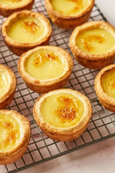 there are many small pies on the cooling rack