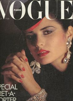 a magazine with an image of a woman wearing jewelry on it's front cover