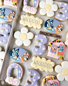 decorated cookies in the shape of numbers and characters