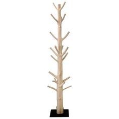 a tall wooden tree on a black stand