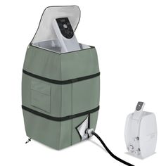 an electronic device is plugged in to the back of a cooler with its lid open