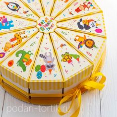 a yellow and white box that has an umbrella inside of it with animals on it