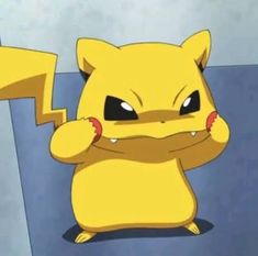 a pikachu is standing in front of a wall with his hands on his chest