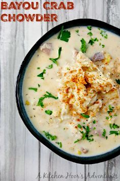 a bowl filled with soup and garnished with parsley