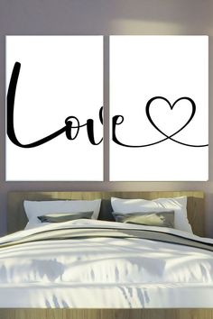 the bedroom wall art is made up of two black and white prints that say love