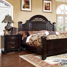 a bedroom scene with focus on the bed and nightstands