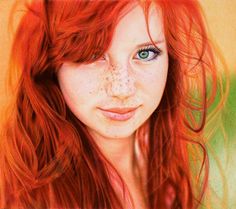 a woman with red hair and freckles on her face