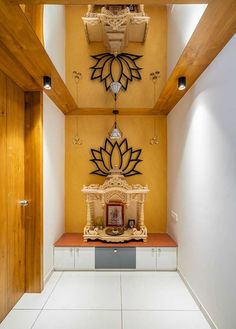 an ornate fireplace in the middle of a room